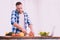 Excited man doing his best to cook something delicious