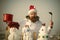 Excited man in santa hat and uniform on winter day