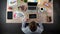 Excited man writing idea on blackboard, full of inspiration to begin working day