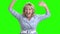 Excited mature woman on green screen.