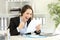 Excited office worker reading a letter