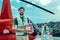 Excited short-haired guy working as volunteer and holding first aid box