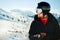 Excited skier man in black jacket ski goggles mask text friends shot on mobile phone spend weekend winter in mountains isolated on