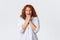 Excited and thrilled redhead middle-aged woman, female entrepreneur think-up excellent idea, looking cunning and happy