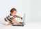 Excited Toddler Using a Laptop