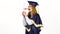 Excited woman graduate in gown with diploma. White