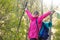 Excited woman outdoors hiking