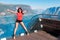 Excited woman tourist at Stegastein Viewpoint