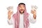 Excited young Arab holding few stacks of money
