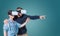 Excited young couple using a VR headset glasses