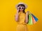 Excited young women enjoying shopping , Carrying many bags of many colors