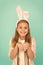 Excitement of easter season. Cute little girl wearing bunny ears headband. Fashion accessory for easter costume party