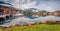 Exciting autumn view of Grundlsee lake with small yacht.