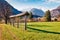 Exciting autumn view of Triglav mountain range and Gozd Martuljek village. Picturesque morning scene of Julian Alps, Slovenia, Eur