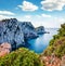 Exciting morning view of Cape Lefkatas with old lighthouse. Sunny spring seascape of Ionian Sea. Beautiful outdoor scene of Lefkad