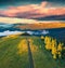 Exciting morning view from flying drone of Brailka valley with old country road.