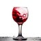 Exciting red wine splashing in a beautiful glass