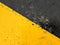 Exciting yellow and black graphic texture painted on rough surface.