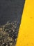Exciting yellow and black graphic texture painted on rough surface.
