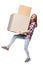 Exciting young female carrying heavy cardboard boxes tending to fall