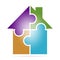 Exclusive Corporate business colorful sign with a house made of four puzzles of different colors . Icon of family house on a white