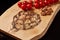 Exclusive painted art cutting board made of wood organic serving dishes with taste food cuisine delicious juicy vegetables red