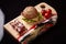 Exclusive painted art cutting board made of wood organic serving dishes with taste food cuisine sandwich, burger, bread and butter