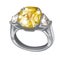 Exclusive ring made of platinum with inlaid yellow diamond isolated on white background. An instance of boutique jewelry