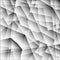 Exclusive symmetrical diagonal monochrome pattern of chaotic black and white fragments of glass, metal, glare