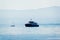 Excursion ferry with Swiss flag on Lake Geneva in Lausanne