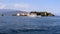 Excursion motor boat passing by Isola Bella, one of the Borromean Islands in Lago Maggiore