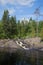 Excursion to the waterfall Ahvenkoski (Ruskeala waterfall) on a sunny summer day. Karelia