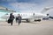 Executive business team leaving corporate jet