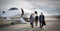 Executive business team leaving corporate jet