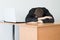 Executive Man Leaning on Desk with laptop