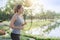 Exercise concept, Young asian runner woman running in the park in sportswear morning time, selective focus