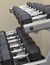 Exercise equipment - dumbbells on weight rack