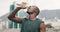 Exercise, running and black man drinking water in city for hydration, rest or recovery from workout. Fitness, street and