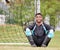 Exercise should be regarded as a tribute to the heart. a young man playing soccer on a field.