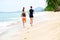 Exercising. Happy Couple Running On Beach. Sports, Fitness. Heal