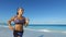 Exercising Runner Jogging and Running On Beach - Girl Exercising In Summer
