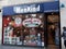 EXETER, DEVON, UK - December 03 2019: MenKind store front on Exeter High Street.  Displays in the shop window advertise Christmas