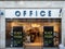 EXETER, DEVON, UK - December 03 2019: Office shoe shop store front on Exeter High Street. Posters in the window advertise Black Fr
