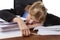 Exhausted businesswoman sleeping on desk