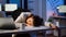 Exhausted overload business woman falling asleep on desk
