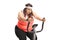 Exhausted overweight woman exercising on a stationary bike