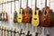 Exhibition samples of electric instruments and guitars on the stand.