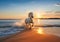 Exhilarating Image of Horses Running on a White Sand Beach, Perfect for Stock Imagery Generative AI Illustration