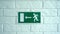 Exit emergency sign in 4K slow motion. An exit sign hangs on a wall. 4k stock footage.