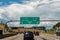 Exit signs on I225 for Interstate 25 North toward Denver and South toward Colorado Springs